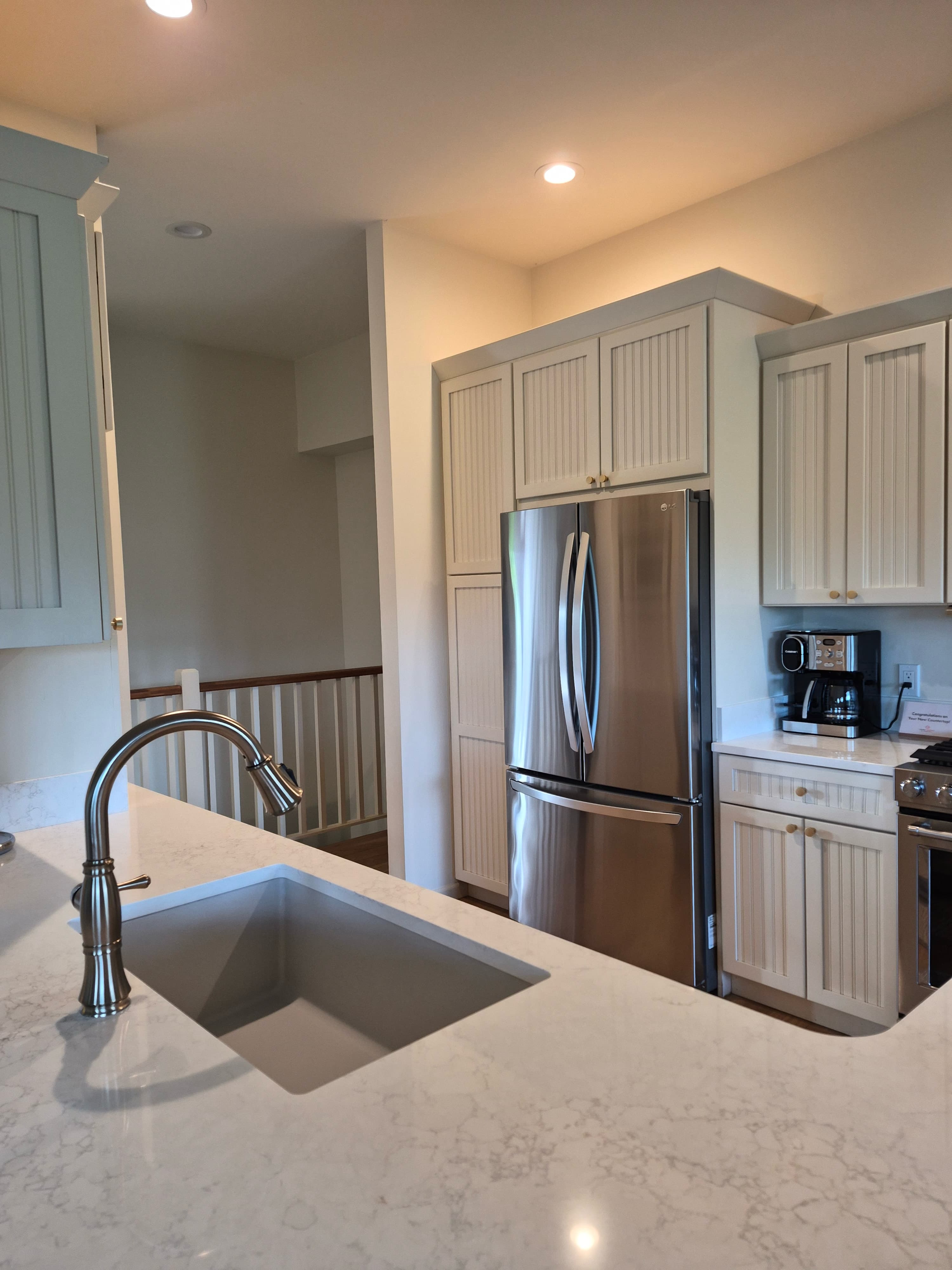 Kitchen island and sink, wiped and shining